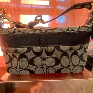 Authentic Coach bag. Gently used, has a few marks (as seen in photos)